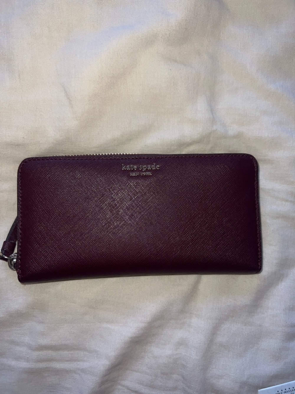 kate spade Plum/ Maroon Saffiano Zip Wallet with Gold Logo